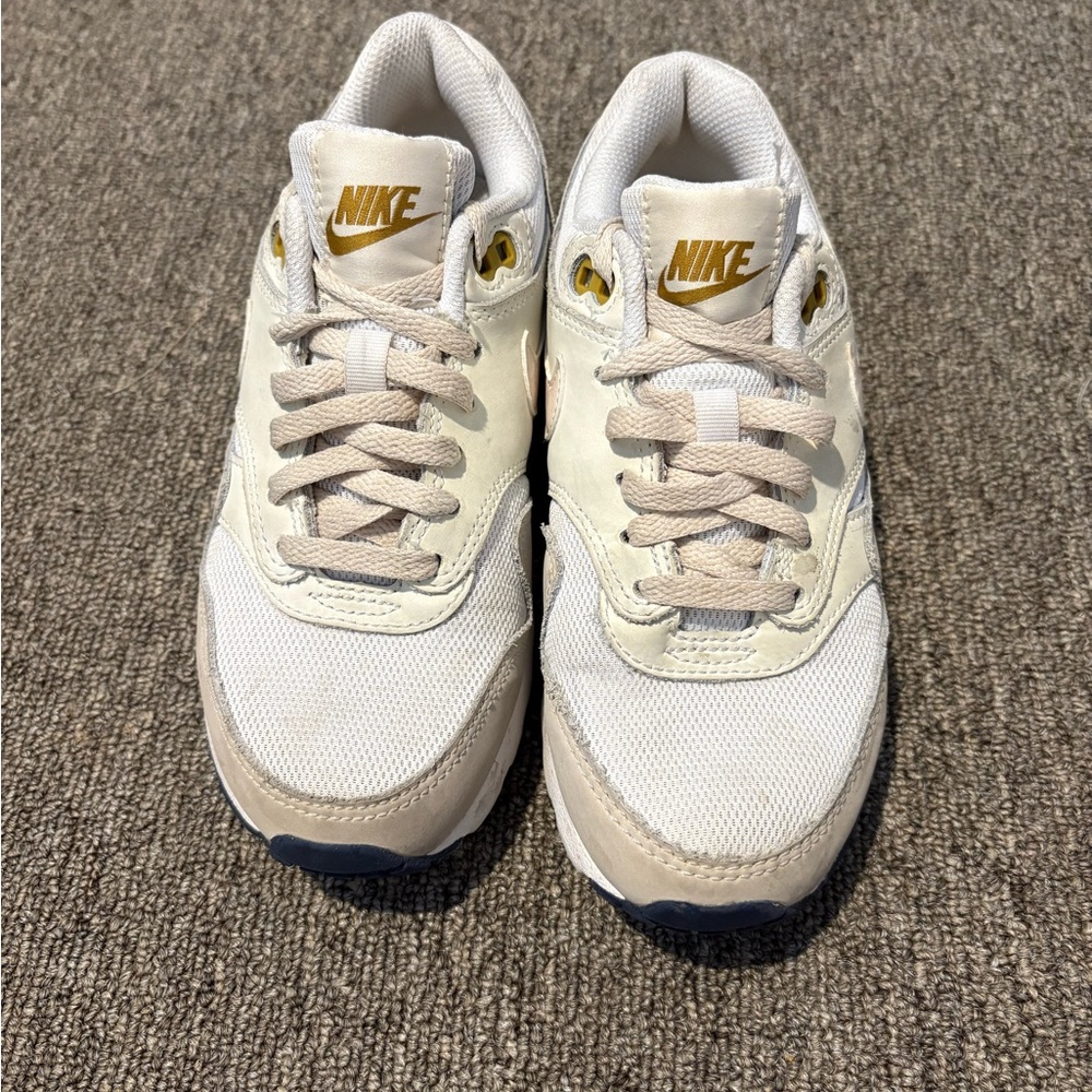 Nike White and Gold Sneakers